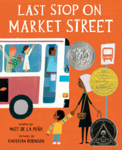 Last Stop on Market Street: “Cover of ‘Last Stop on Market Street’ featuring a colorful illustration of a young boy and his grandmother riding a city bus.” A part of the 10 must-read black children's books